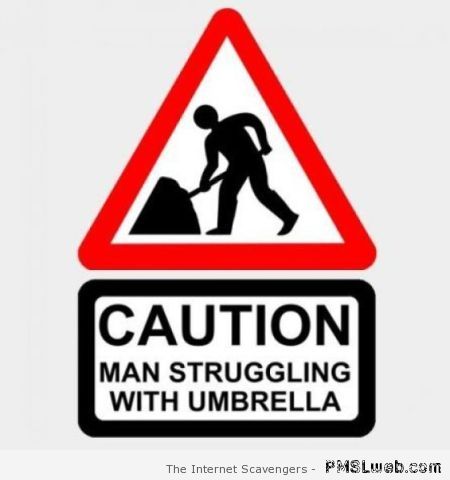 Caution man struggling with umbrella at PMSLweb.com